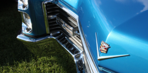 Shiny surface of metallic blue cadillac after the application of ceramic coating.